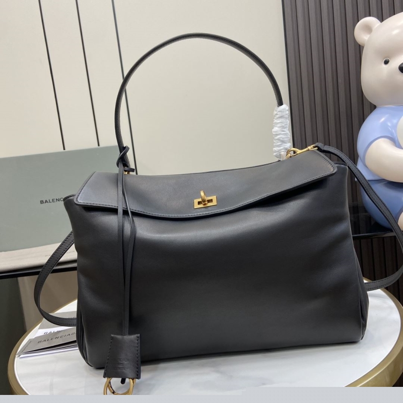 G*u*i top handle bags
